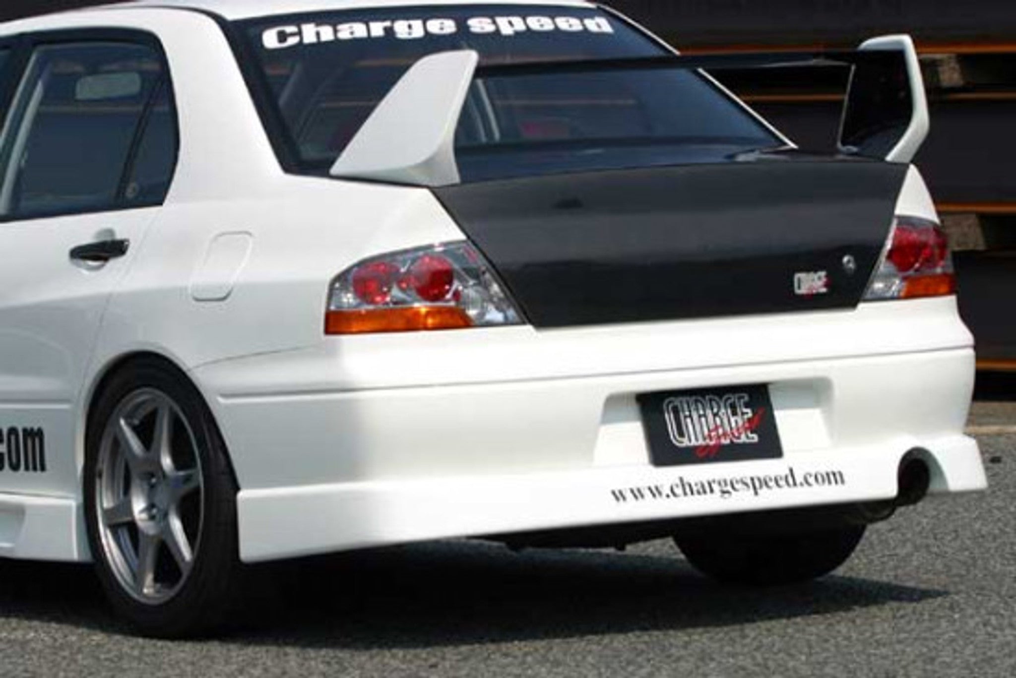 Charge Speed 2002-2005 Mitsubishi Lancer Evo VII & VIII Rear Skirt-Fit JDM Only (Japanese FRP)- MUST USE JAPANESE BUMPER COVER