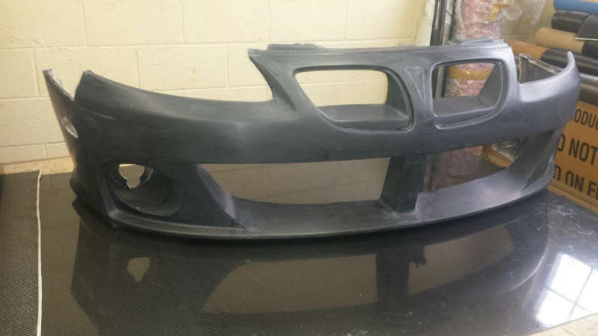 VH649FBC - Advan GM Concepts Design 2004-2007 Pontiac GTO Front Bumper with integrated Carbon Bottom (CFRP/ FRP)
