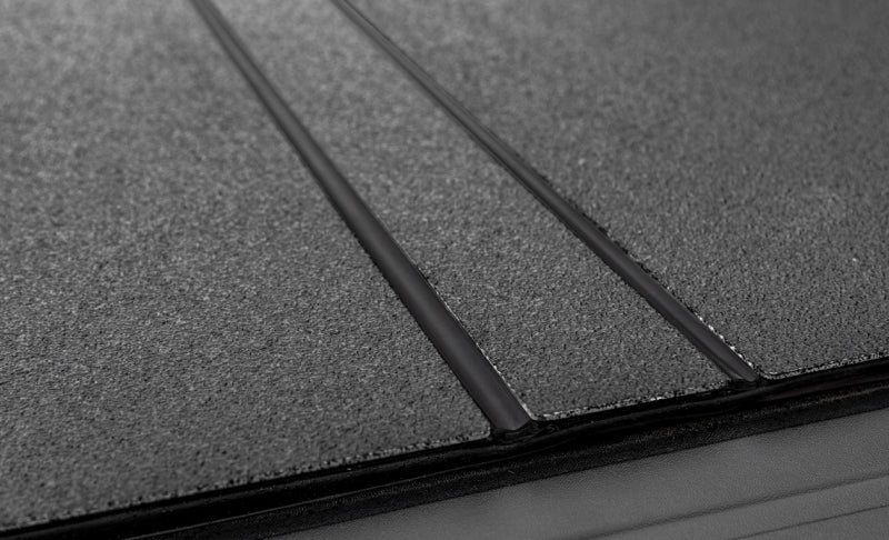 Access LOMAX 2022+ Nissan Frontier 6ft Bed Tri-Fold Hard Cover - Black Urethane