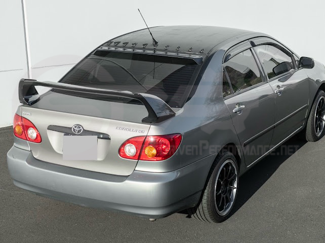 2003-2008 Toyota Corolla | JDM Tape-On Tinted Black Rear Roof Window Visor Guard