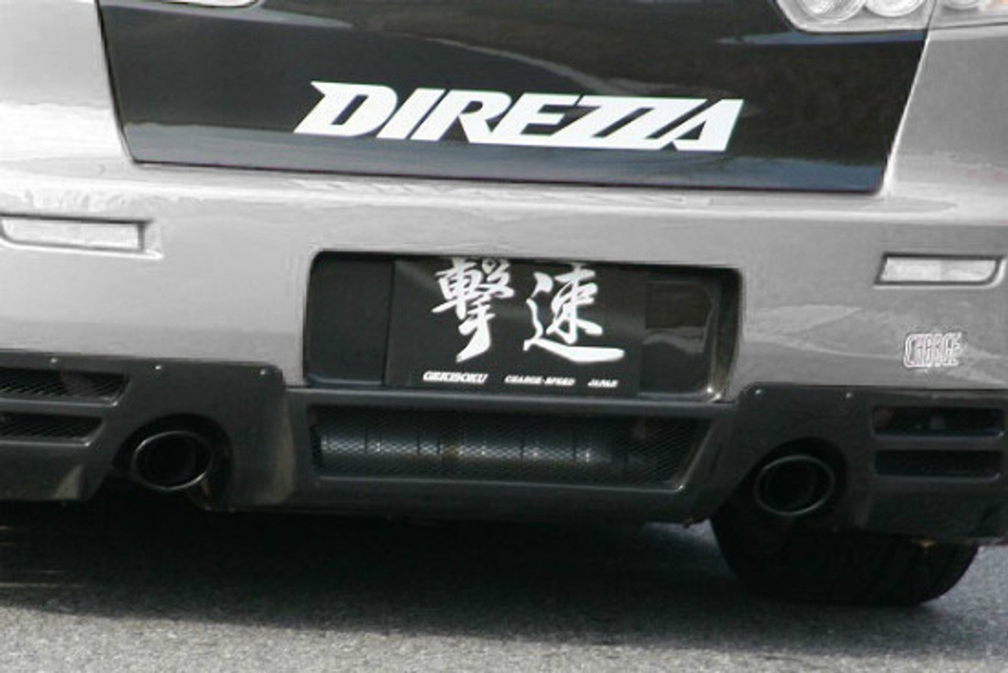 Charge Speed 2008-2017 Mitsubishi Lancer/ Lancer EX/ Ralliart/ Evo X Rear License Plate Cowl Carbon