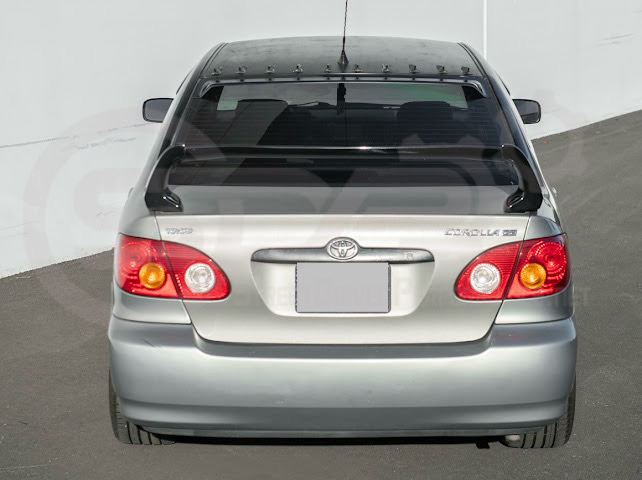 2003-2008 Toyota Corolla | JDM Tape-On Tinted Black Rear Roof Window Visor Guard