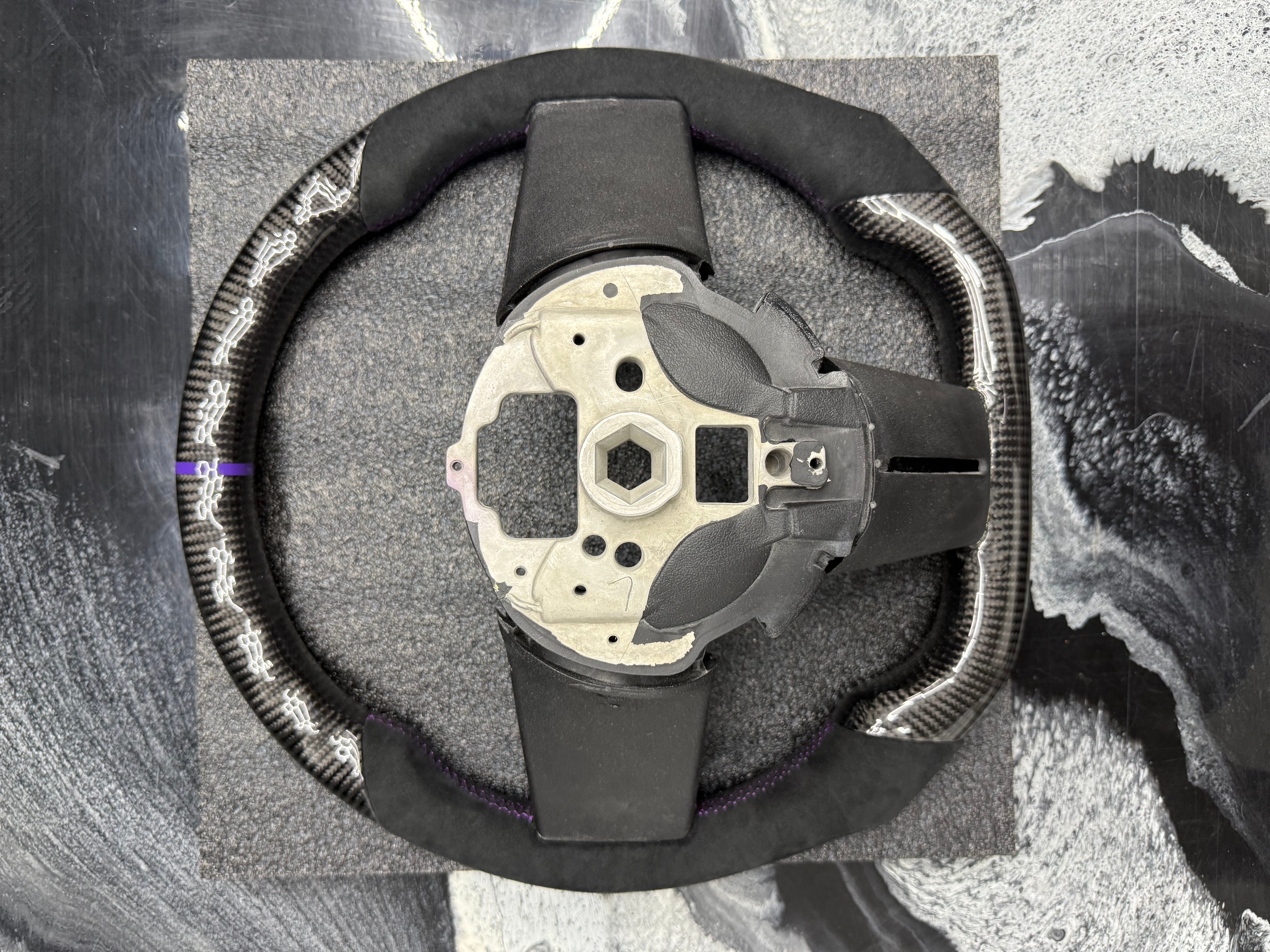 2005 - 2009 Ford Mustang S197
-Custom Carbon Fiber Steering Wheel with Alcantara Suede Hand Grips (Purple Stripe & Stitching) (IN STOCK READY TO SHIP)