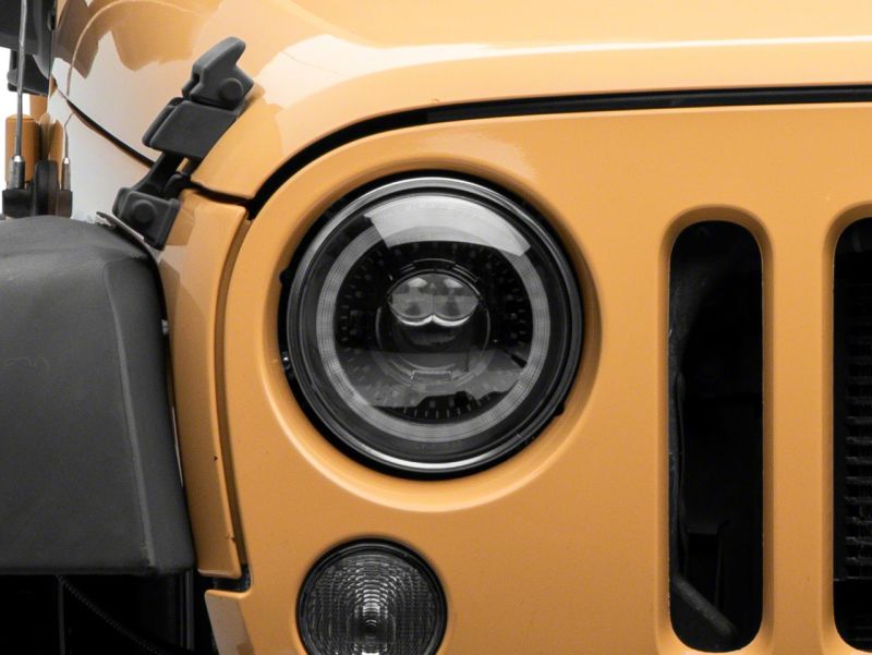 Raxiom 07-18 Jeep Wrangler JK Axial Series 7-In Dragon Eye LED Headlights- Blk Housing (Clear Lens)
